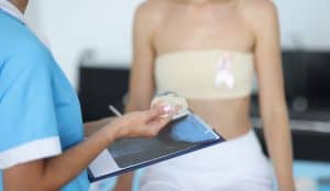 Patient discusses breast implant removal with her doctor